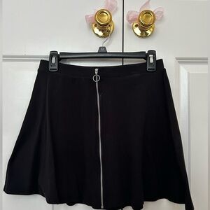 Black, skirt with silver zipper down middle, size Small, brand is So.